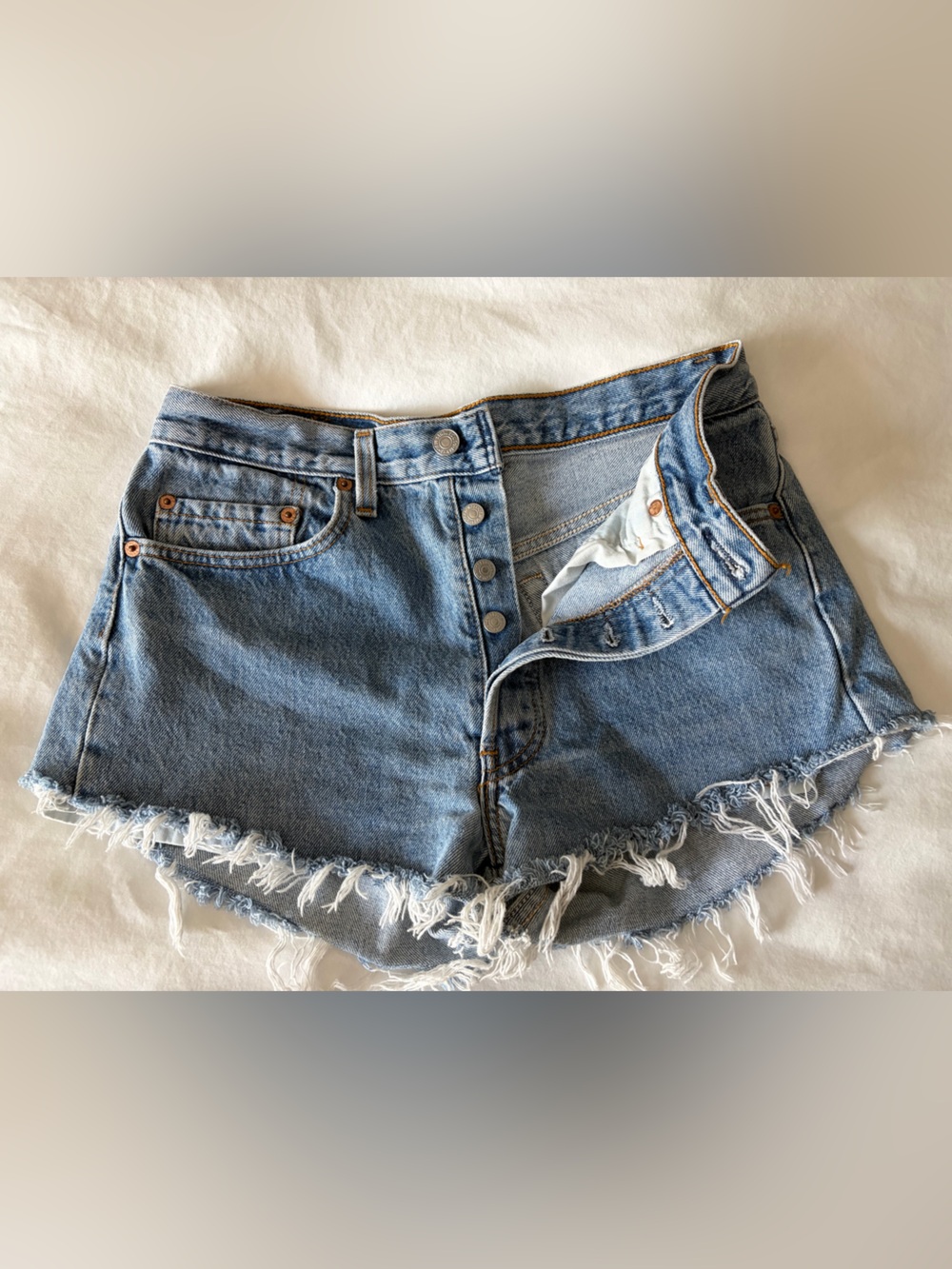 Vintage repurposed Levi's Light Blue Frayed Hem Denim Shorts